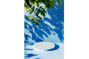 Minimal blue background with green, an Abstract Photo by Lermont51