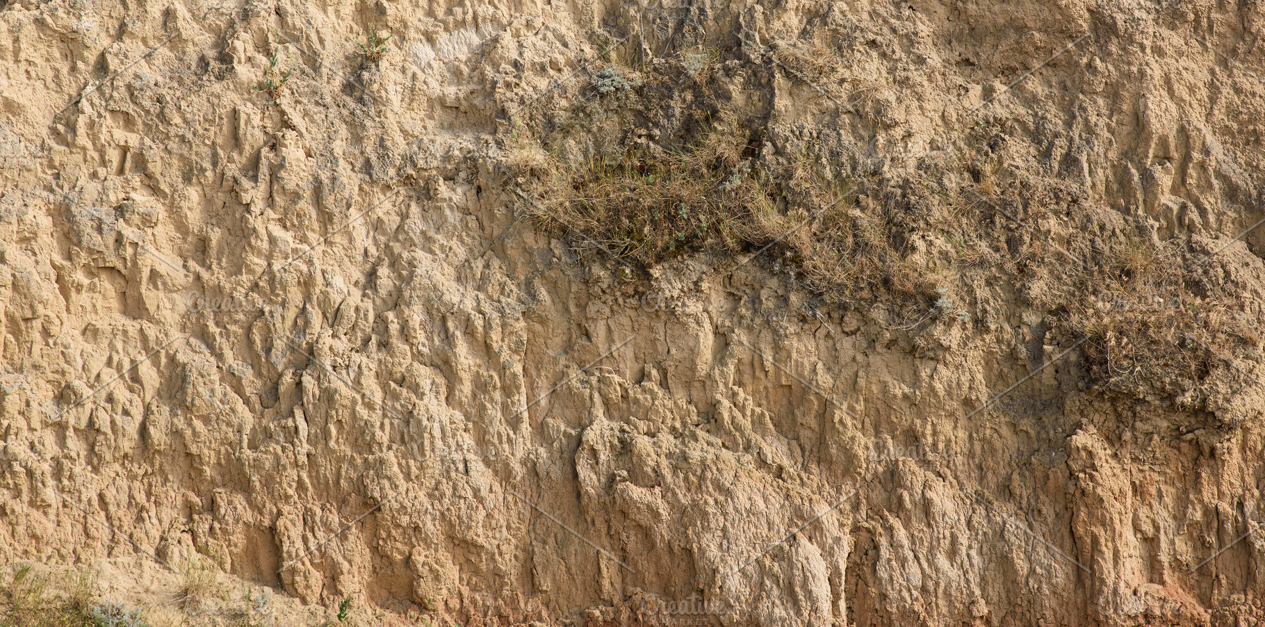 A section of a clay or loess cliff showing its textured, loose c, a Nature Photo by ndanko