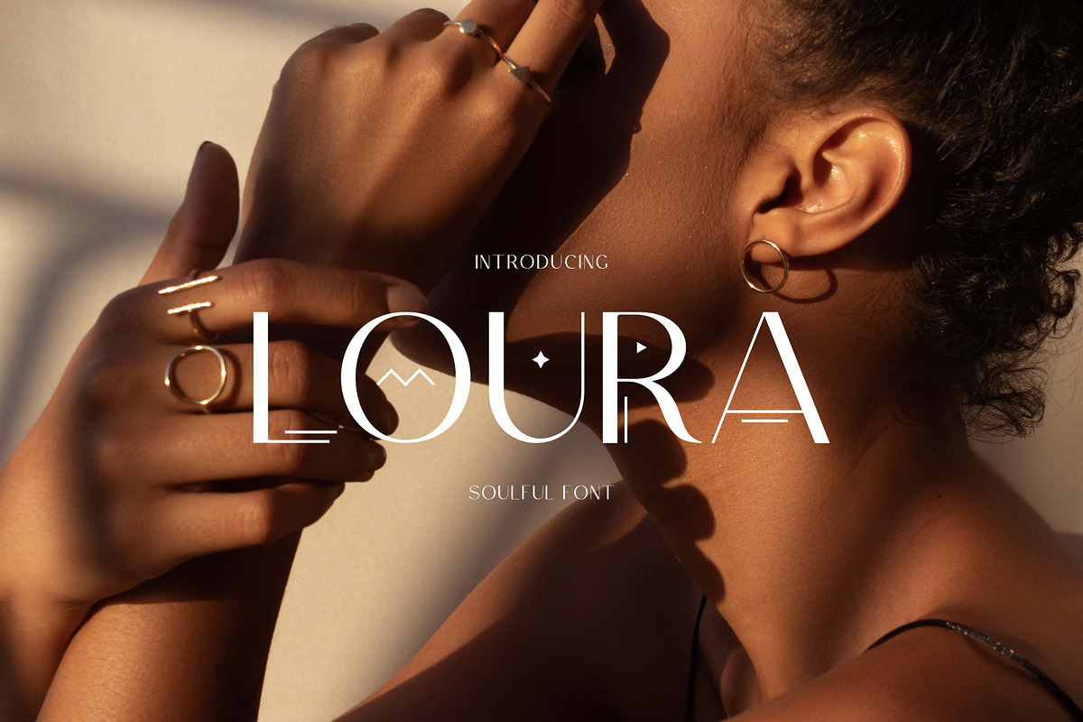 Loura Sans Serif, a Symbol Font by elvinova (Photo 1 of 6)