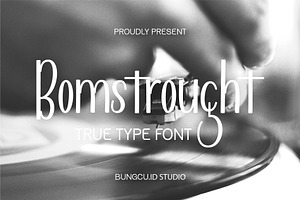 Bomstrought, a Script Font by StudioRz