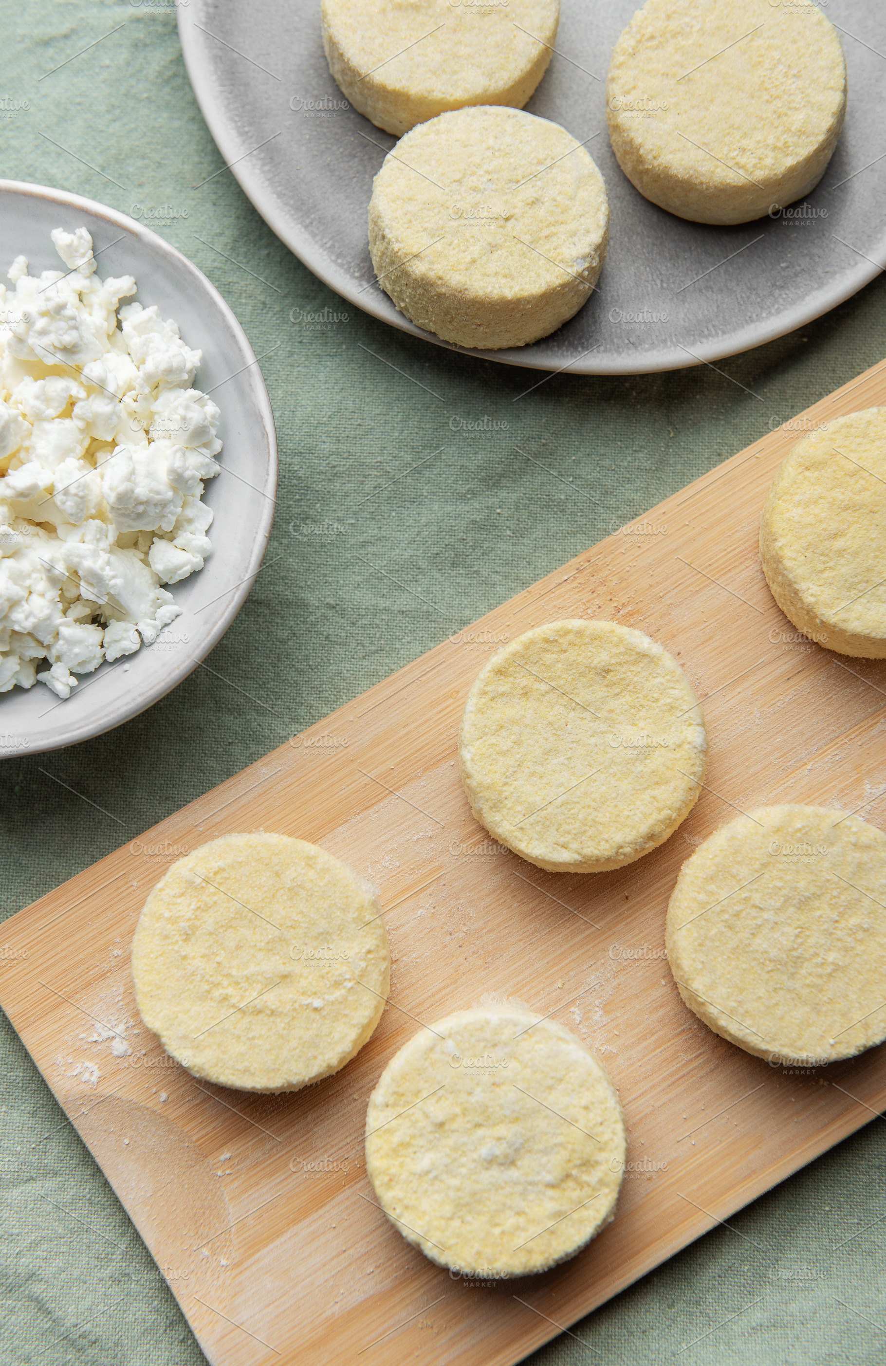 Preparing syrniki cottage cheese pancakes for breakfast on woode, a Food & Drink Photo by Olena Rudo