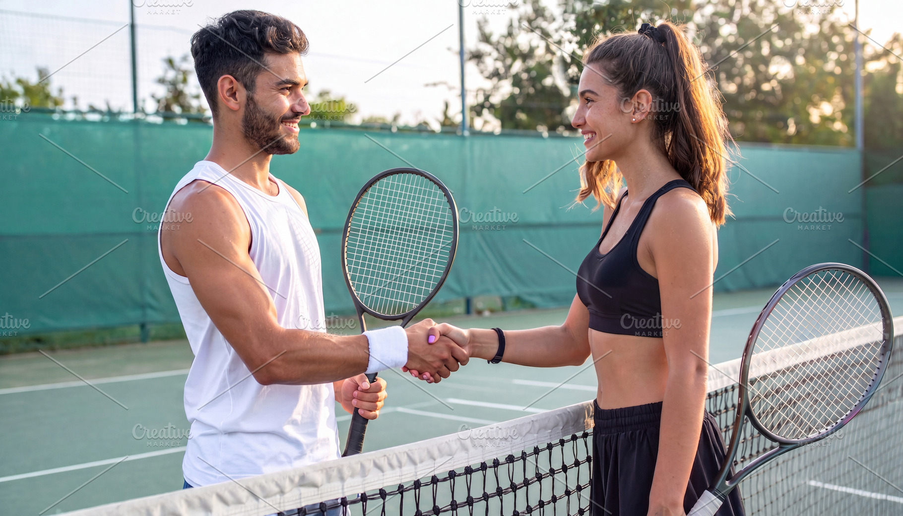 Young Tennis Players Shaking Hands at the Net, a Sports & Recreation Photo by Davizro's Market