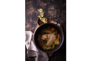Chicken broth soup or bouillon in, a Food & Drink Photo by Yulia Furman