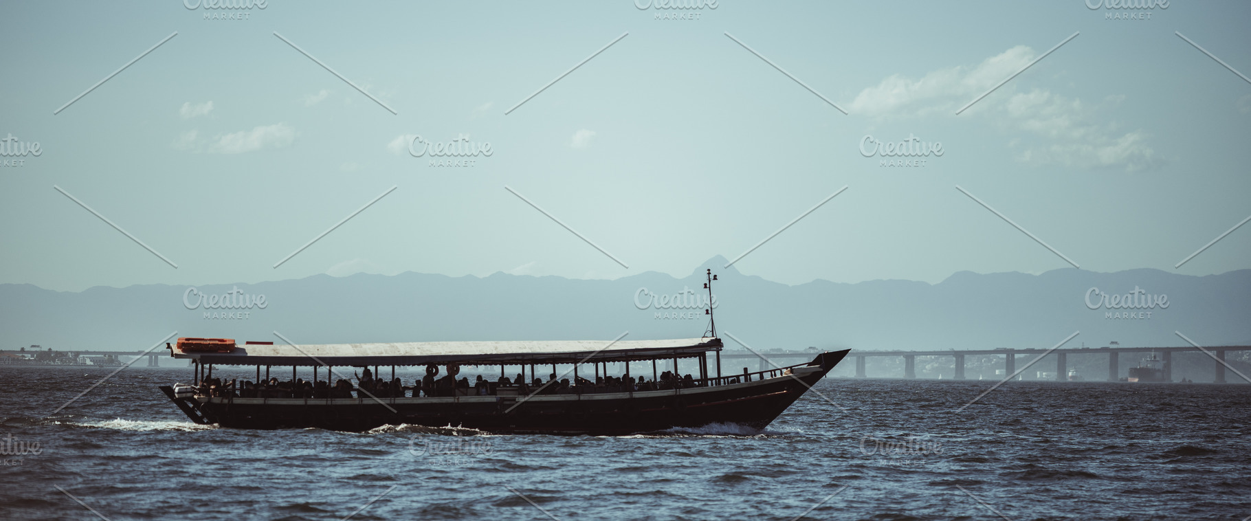 Boat silhouette on open water, a Transportation Photo by SkyNext