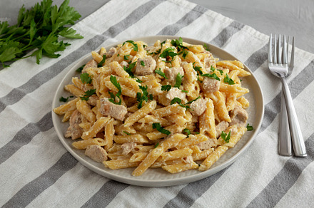 Homemade One-Pot Chicken Alfredo Pasta with Parsley, a Photo by LiudmylaChuhunova
