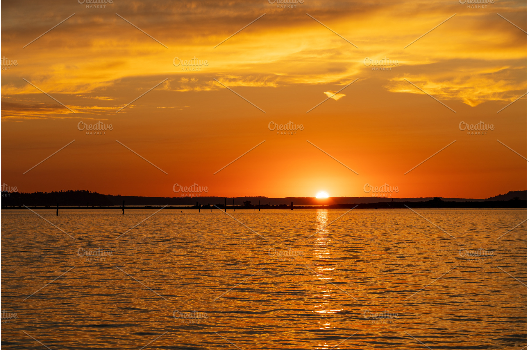 Dramatic sunset clouds over, a Nature Photo by Backyard Stock