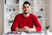 Portrait Of Smiling Handsome Arab Man Sitting At Desk In Home Office, a Photo by Prostock-Studio (Thumbnail 2 of 2)