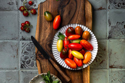 fresh cherry tomatoes and garlic, a Food & Drink Photo by Marina_Pronina