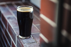Pint of stout on bricks