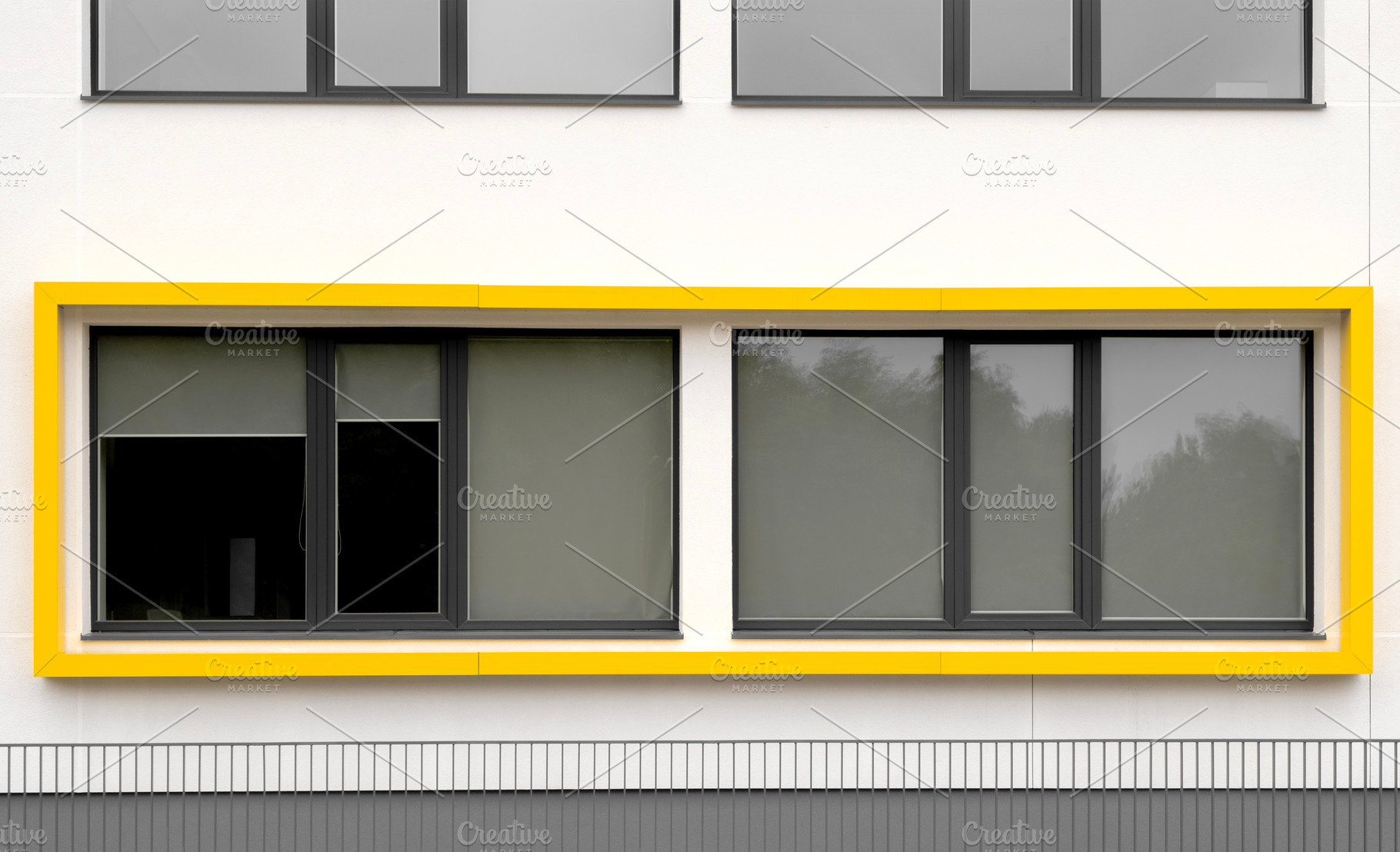 Modern building with yellow window, an Architecture Photo by BOOCYS