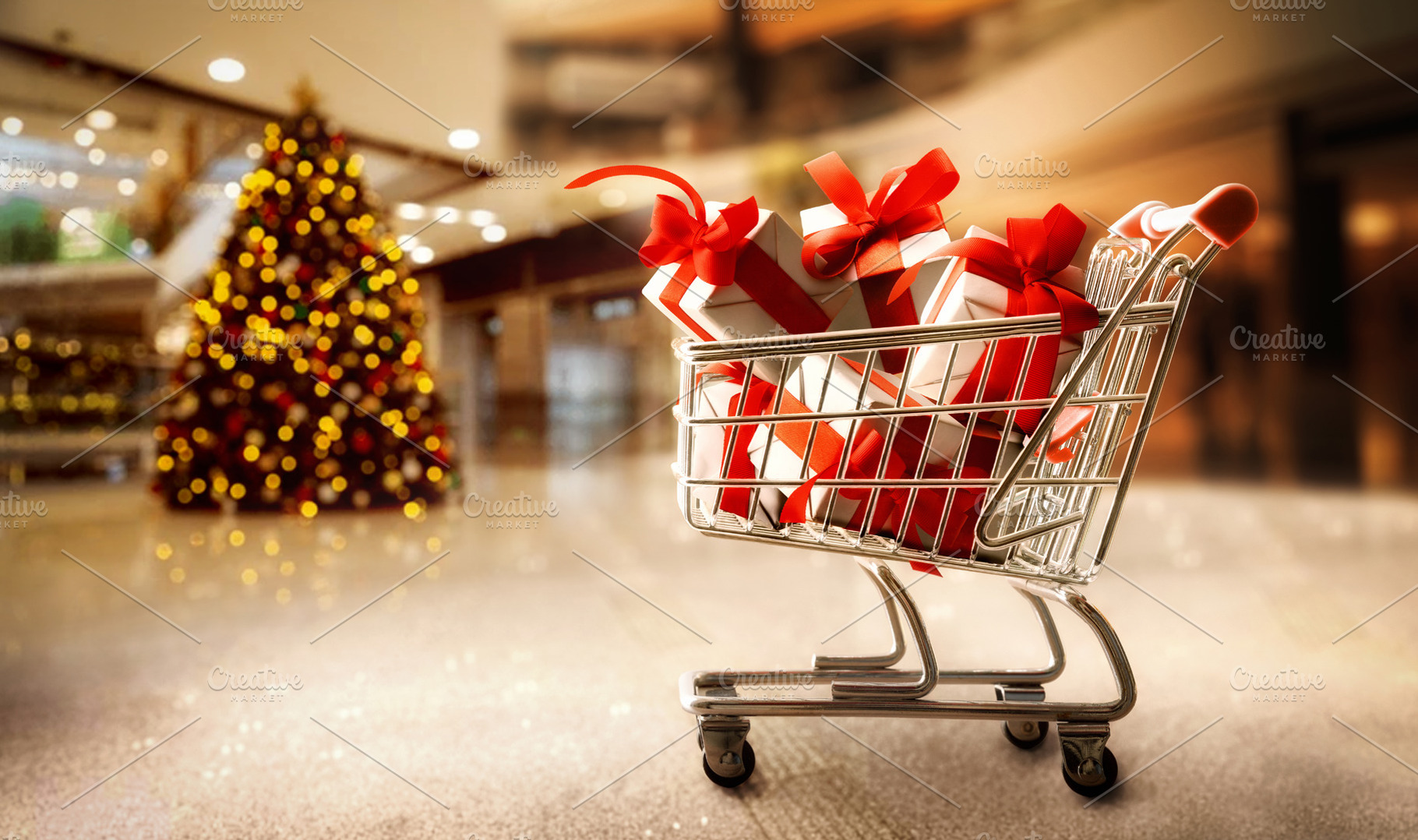 Shopping cart full of gift packages in shopping center, a Holiday Photo by Davizro's Market
