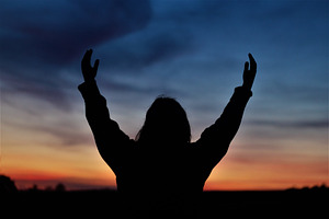 Women are lifting their hands up