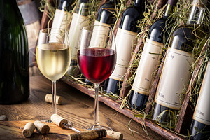 Wine bottles on the wooden shelf., a Food & Drink Photo by Volff