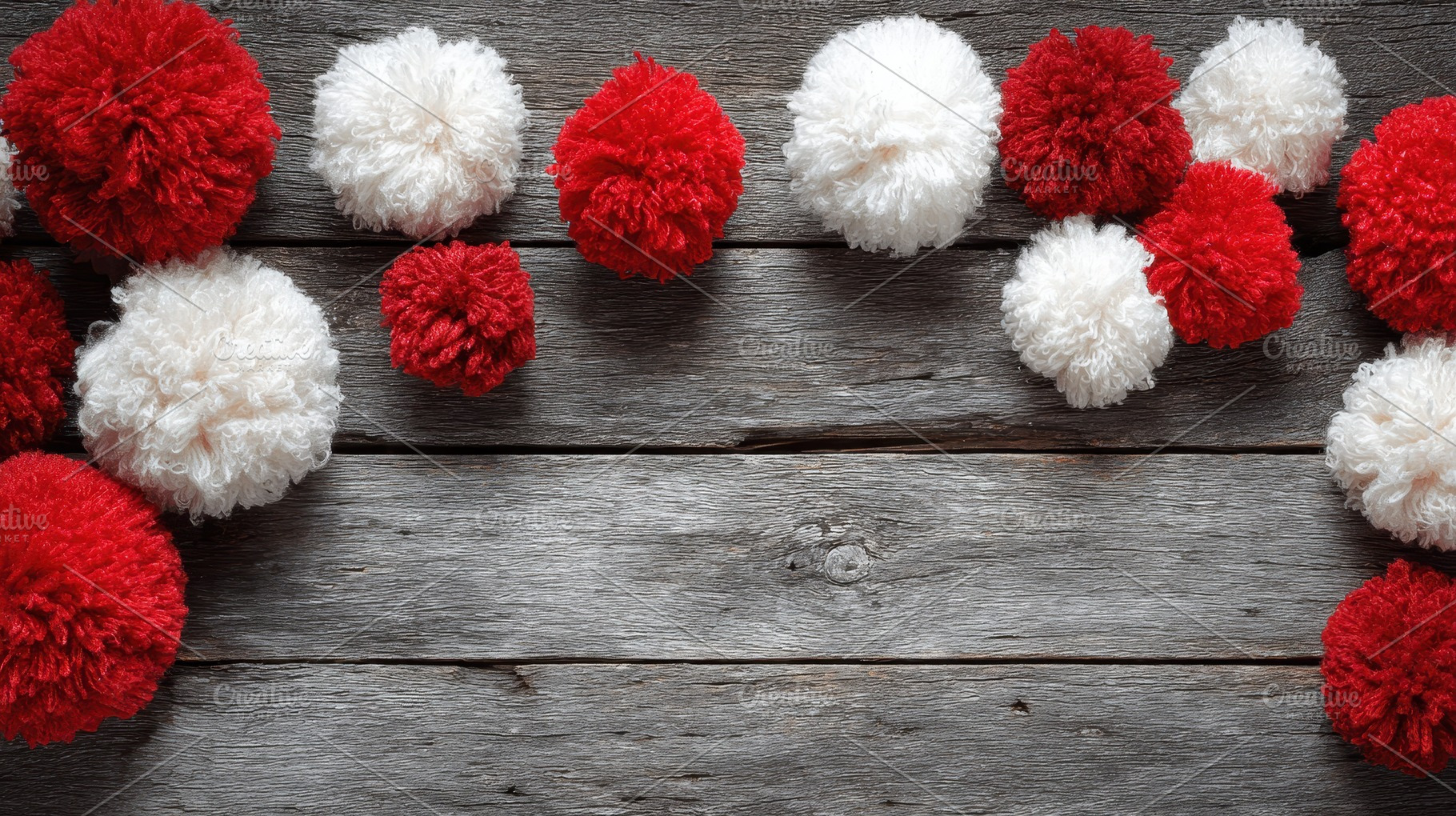Colorful pom poms made of yarn, a Photo by Pavel_design