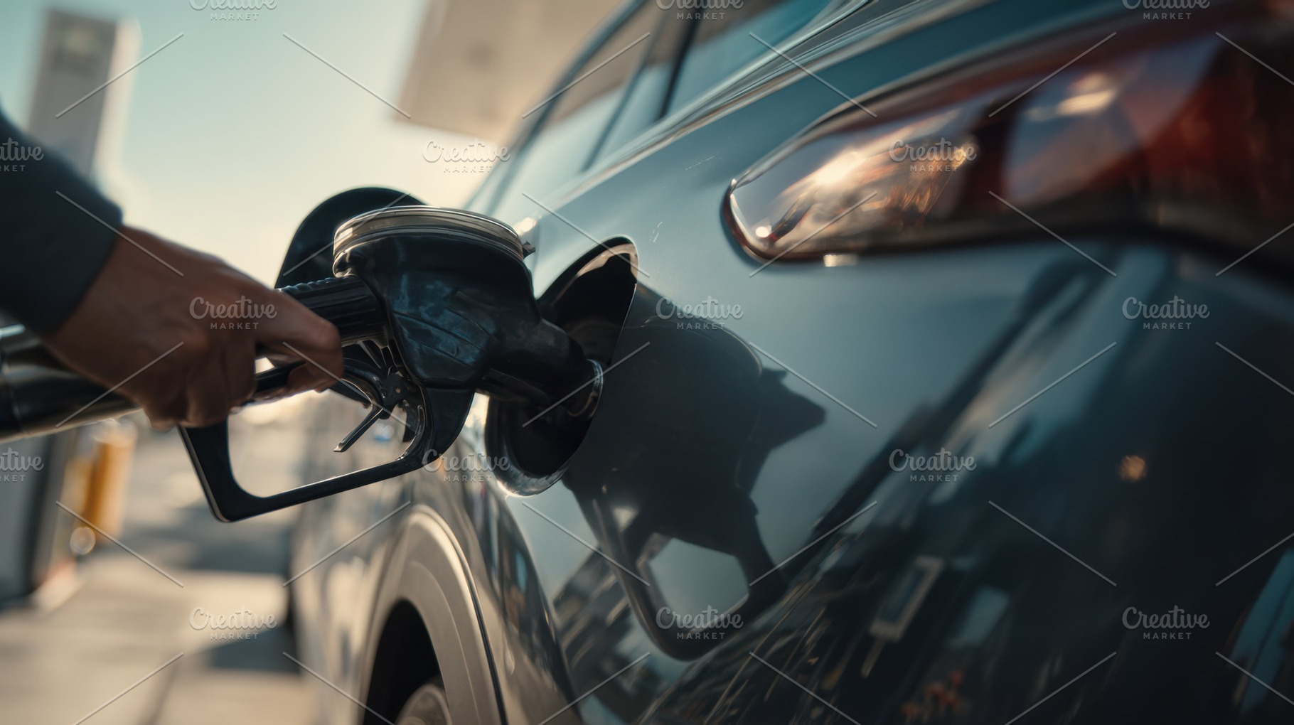 Refueling car at a gas station, a Photo by Beautiful things