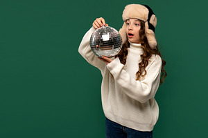 Surprised girl in winter hat looking, a Person Photo by Elena Vagengeim