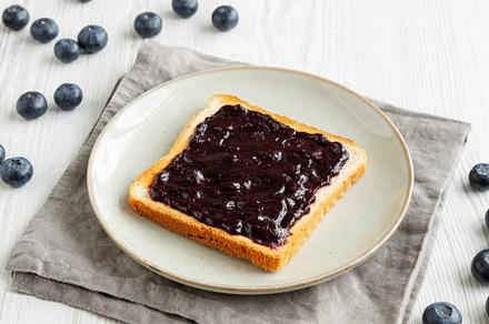 Healthy Blueberry Jelly and Toast on a Plate, side view., a Food & Drink Photo by LiudmylaChuhunova