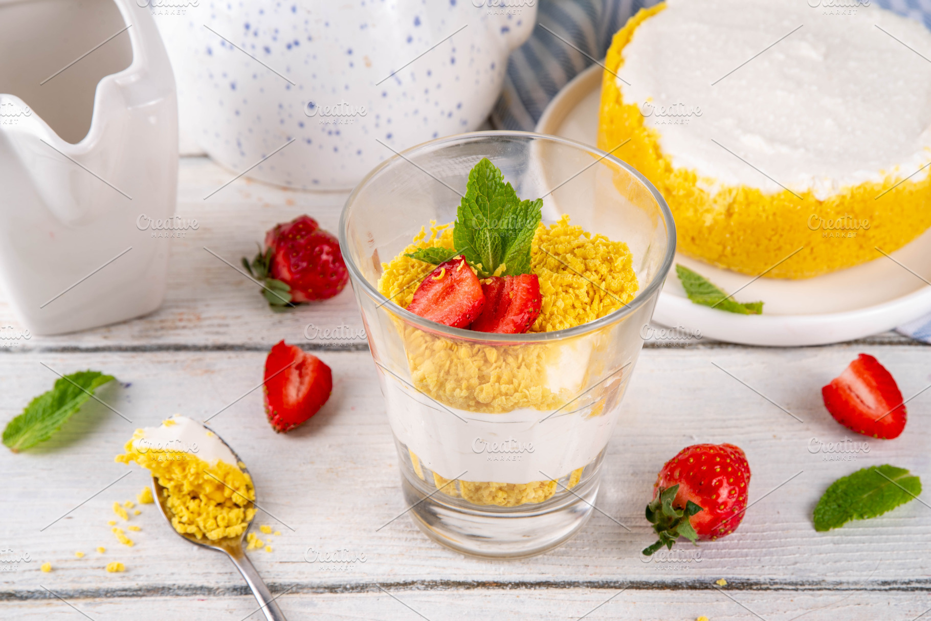 Classic cheesecake in glass, with fresh strawberry and golden co, a Food & Drink Photo by Rimma
