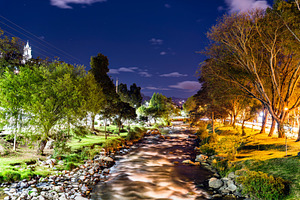 Tomebamba River at night in Cuenca, Ecuador, a Nature Photo by Leonid Andronov