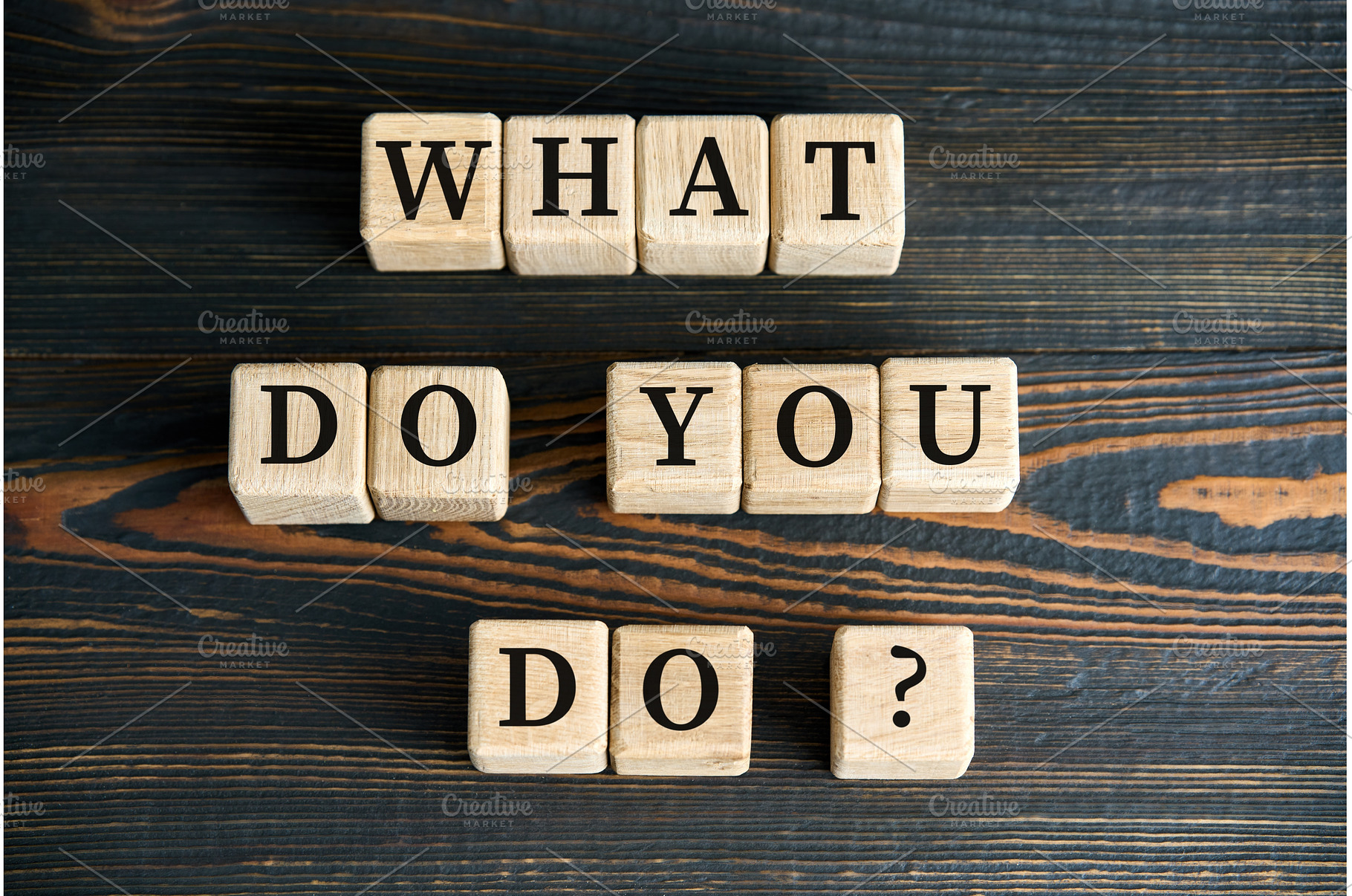 WHAT DO YOU DO phrase on wooden, a Business Photo by Gladkov photography