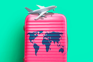 Pink suitcase world map and airplane containing travel, suitcase, and