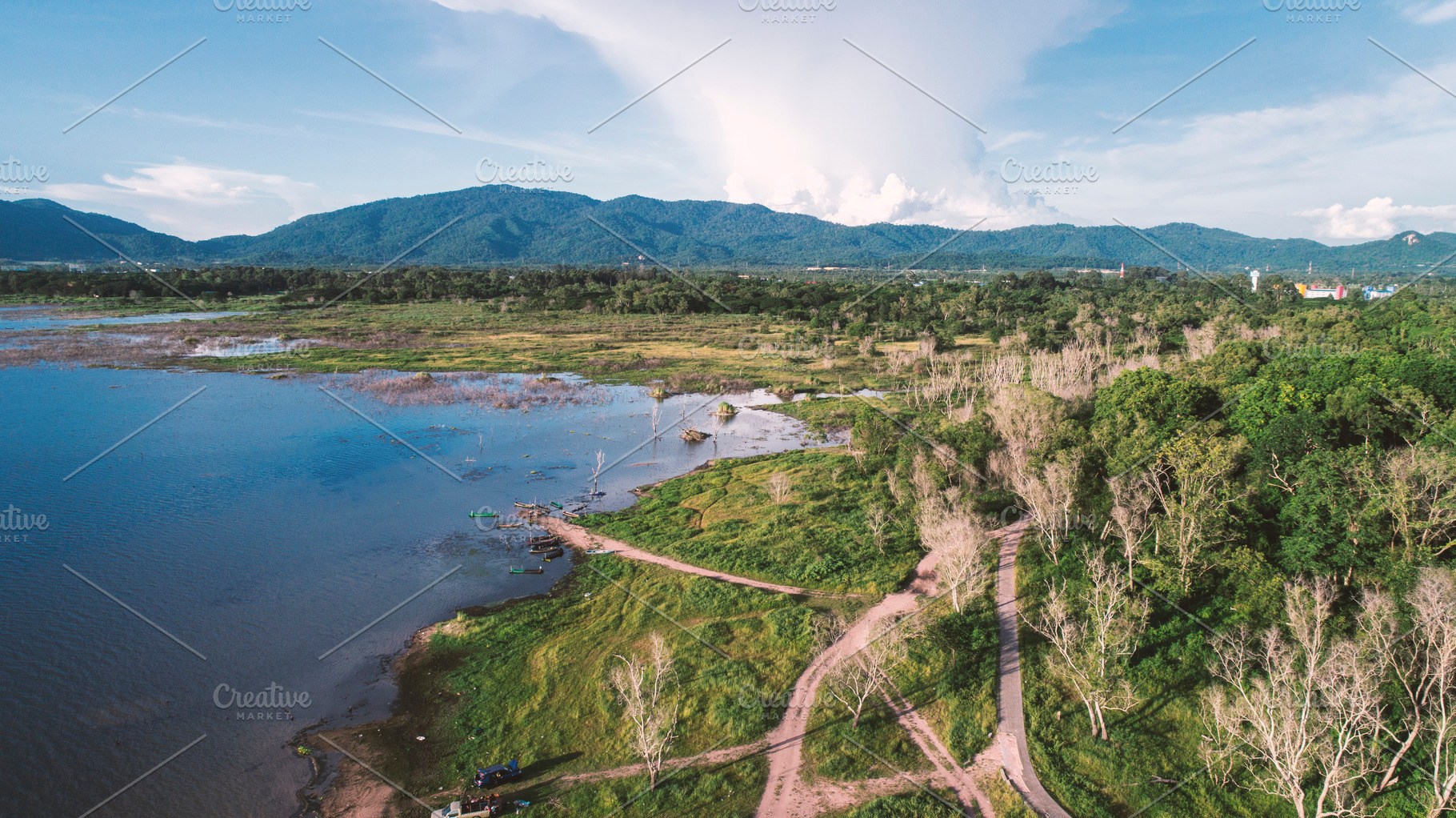 Aerial view of Lake along the forest by drone. Landscape and nat, a Nature Photo by Ministocker