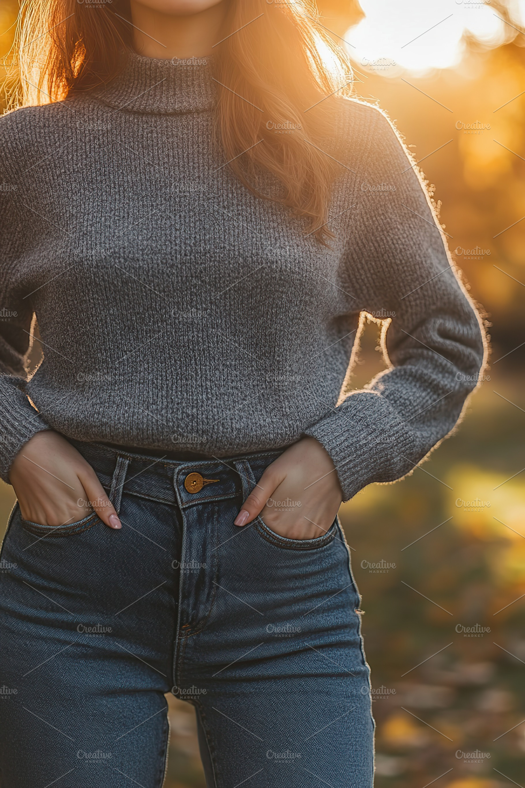 Young woman wearing in grey sweater in autumn park, a Person Photo by AlyaAnd
