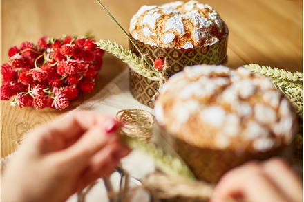 Woman hand preparing cake with, a Holiday Photo by IlliaBondarPhotography