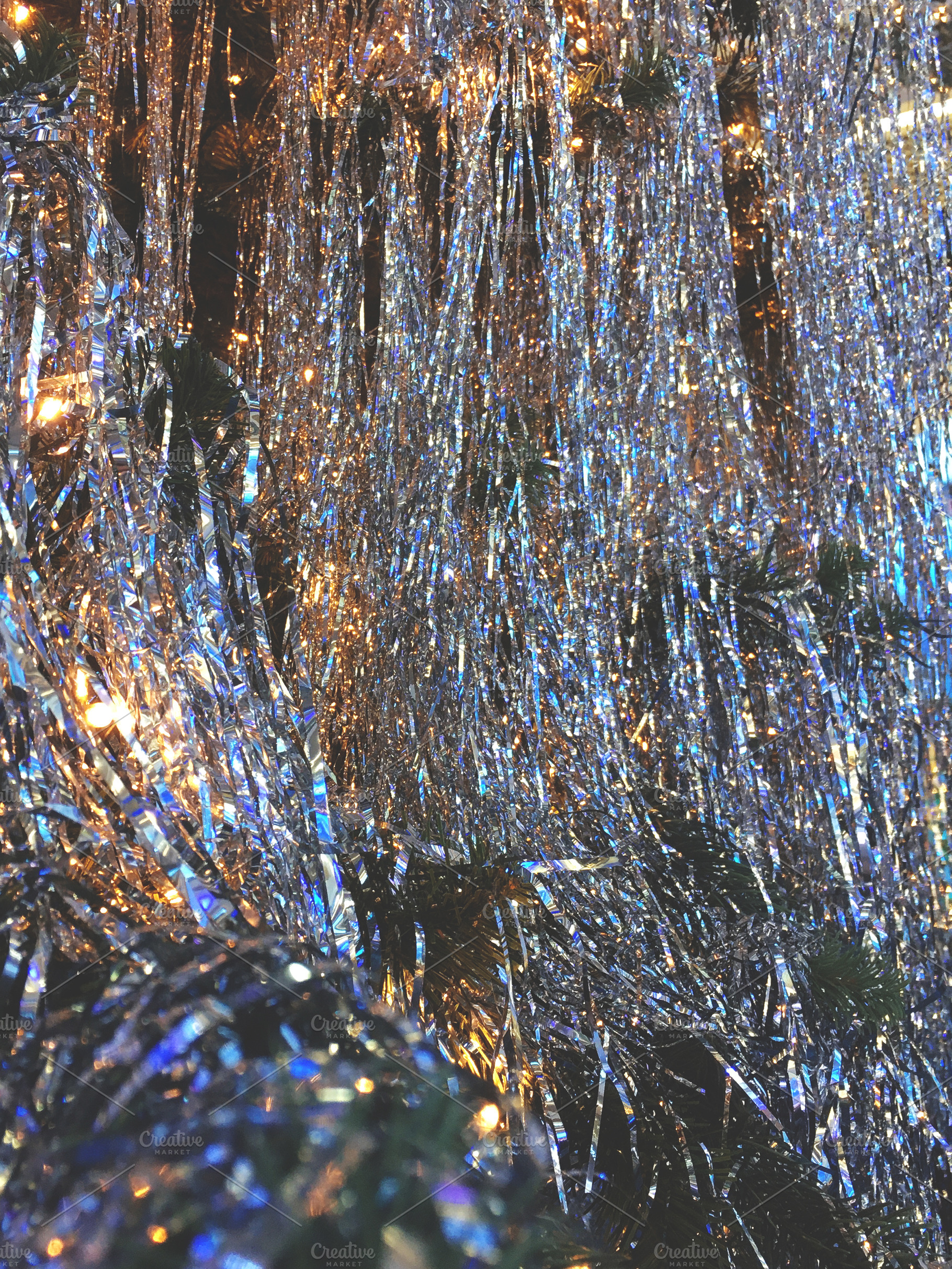Closeup of shiny silver tinsel., a Holiday Photo by rorygez fresh
