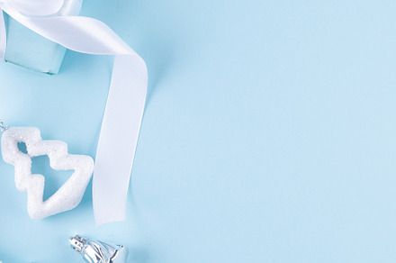 Christmas blue background. Holidays gift box wrapped in blue pap, a Holiday Photo by vimart