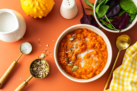 Pumpkin soup with seeds and coconut, a Photo by Pandateam