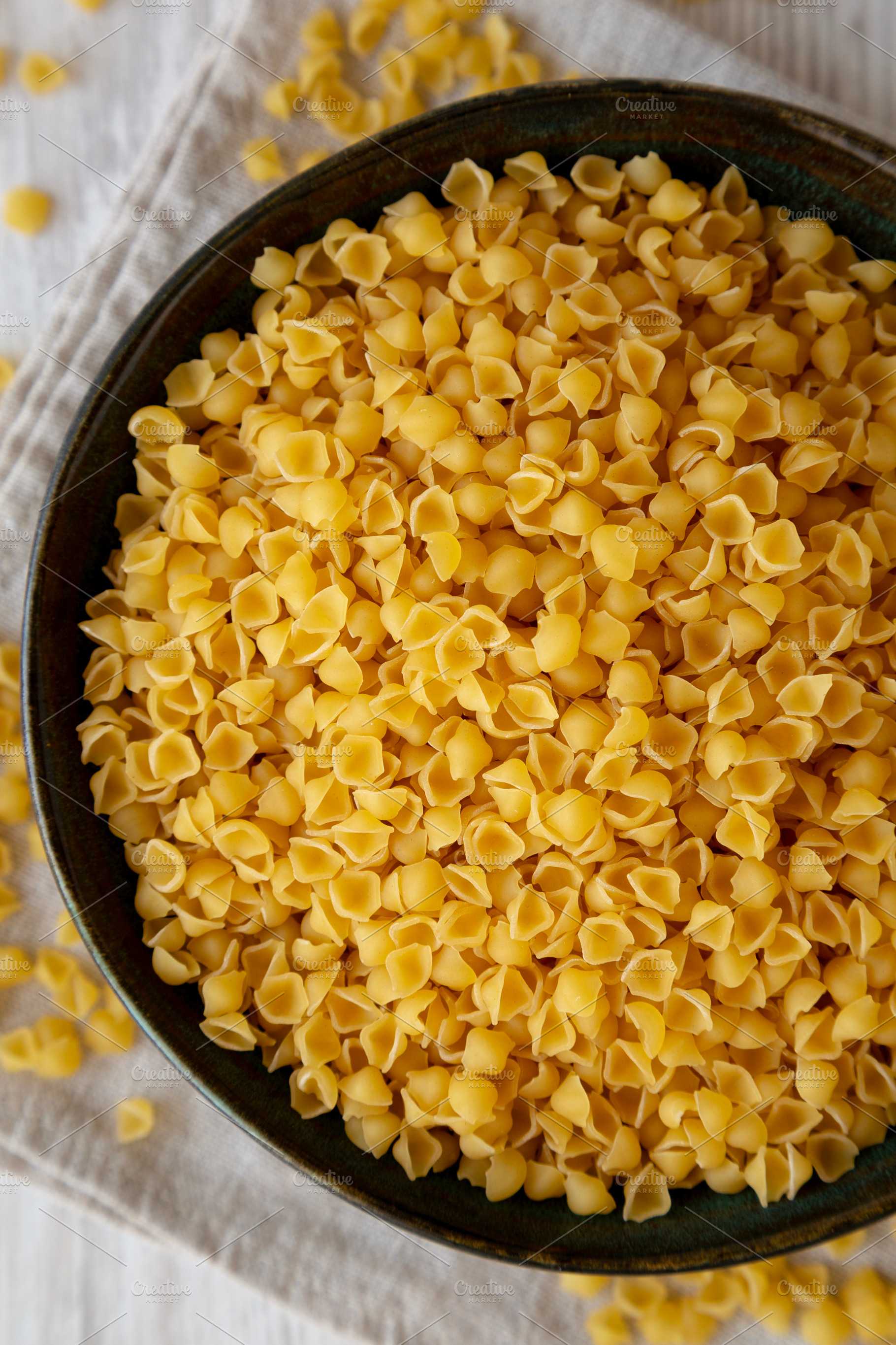 Homemade Perlini Pasta in a Bowl, top view. Close-up., a Food & Drink Photo by LiudmylaChuhunova