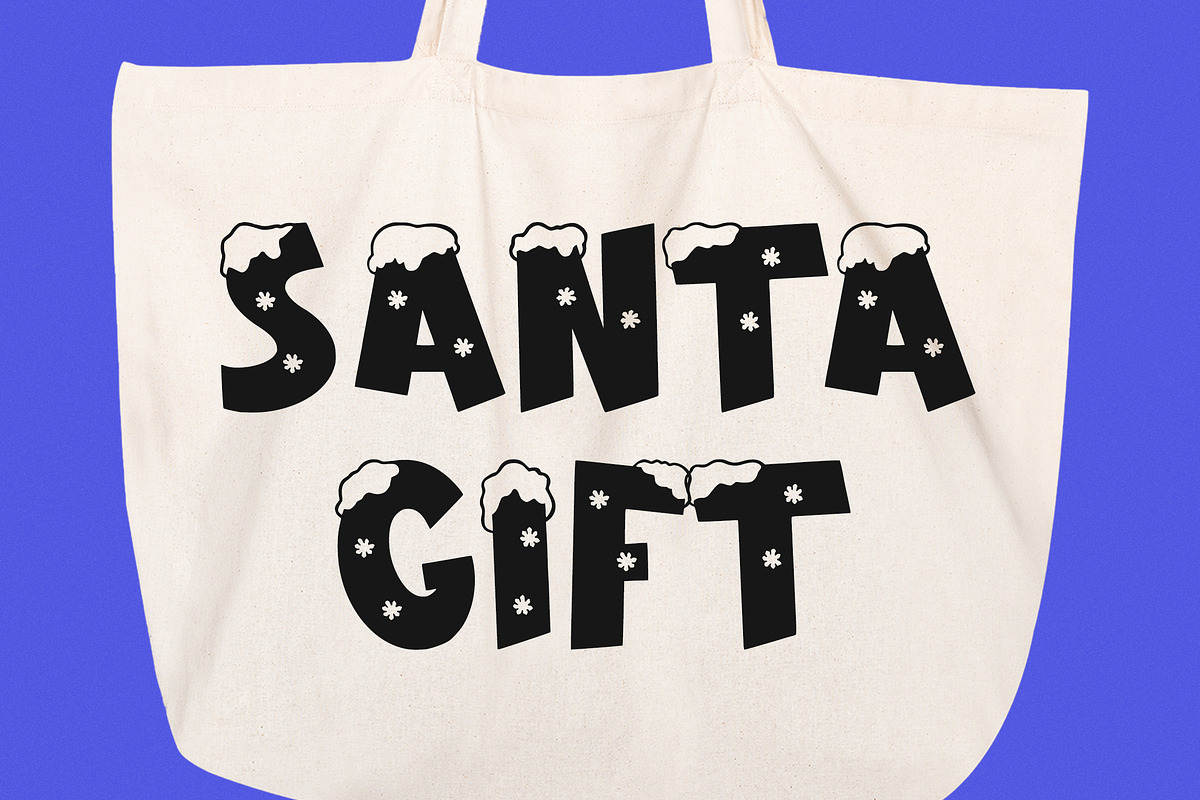 Snow Fall - Christmas Display Font, a Sans Serif Font by Arendxstudio (Photo 6 of 9)