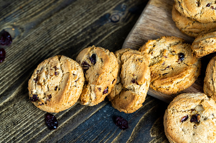 delicious dried cookies made of high-quality flour with dried red cranberries o, a Photo by MyPhotos