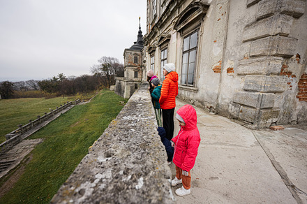 Mother with four kids visit balcony Pidhirtsi Castle, Lviv regio, a Person Photo by AS photostudio