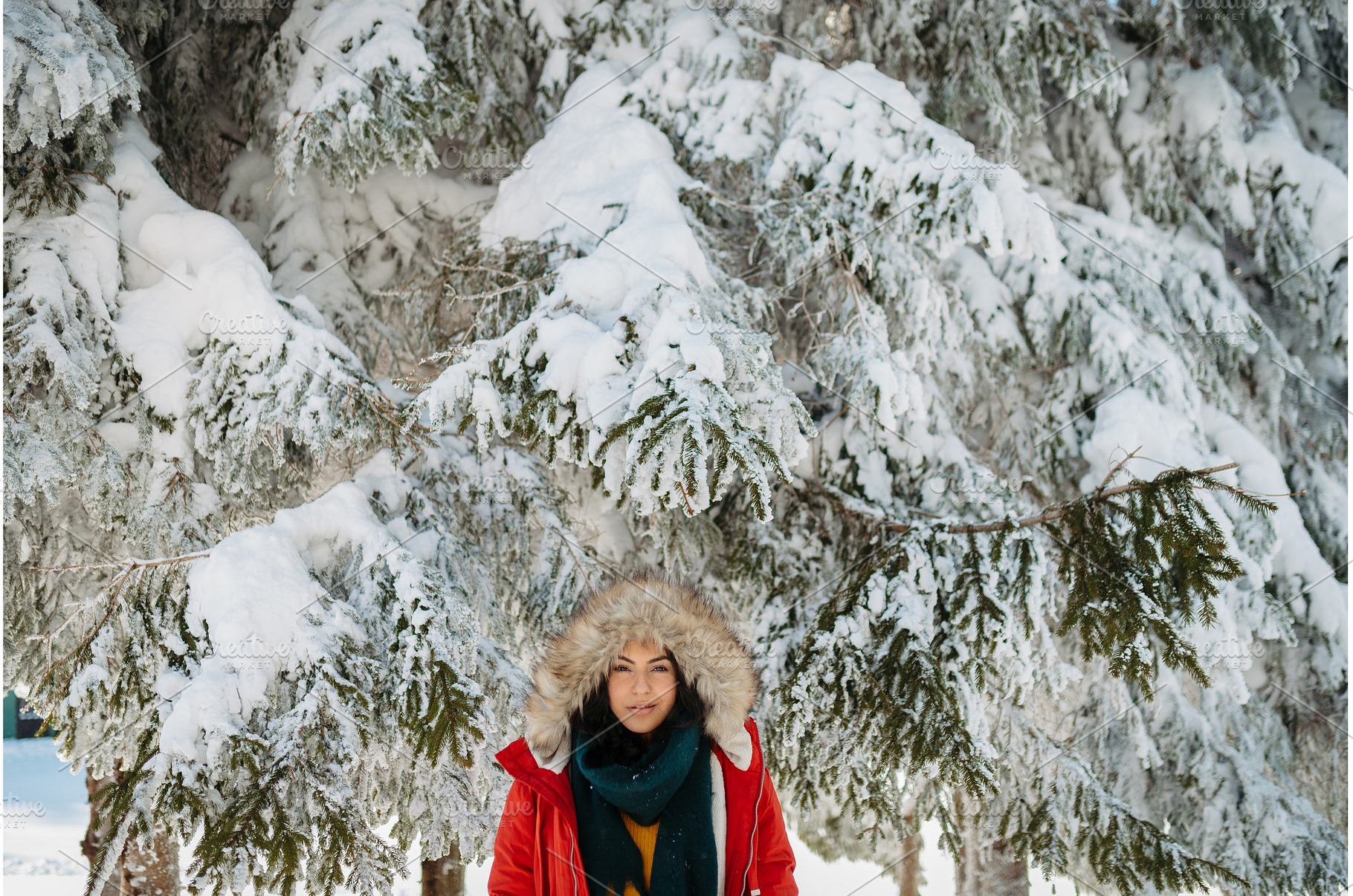 Woman enjoying winter time in snowy, a Person Photo by HalfPoint
