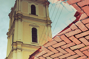 Church reflected in water puddle, an Architecture Photo by BOOCYS