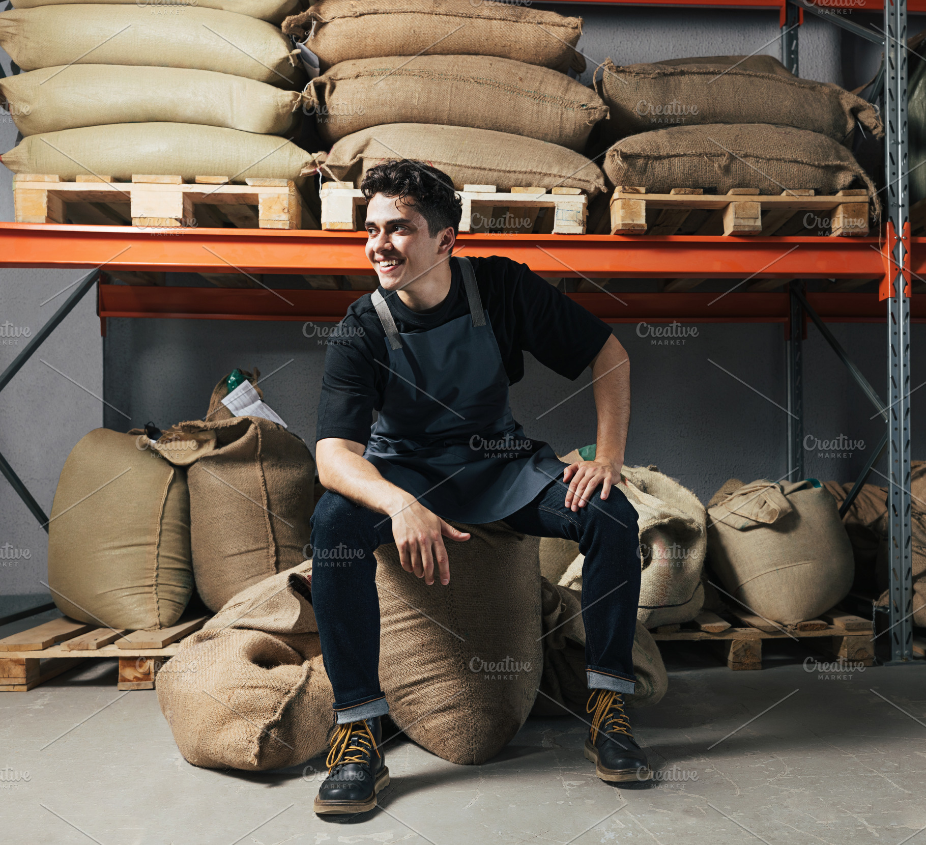 Cheerful male warehouse worker, a Person Photo by Artem Varnitsin