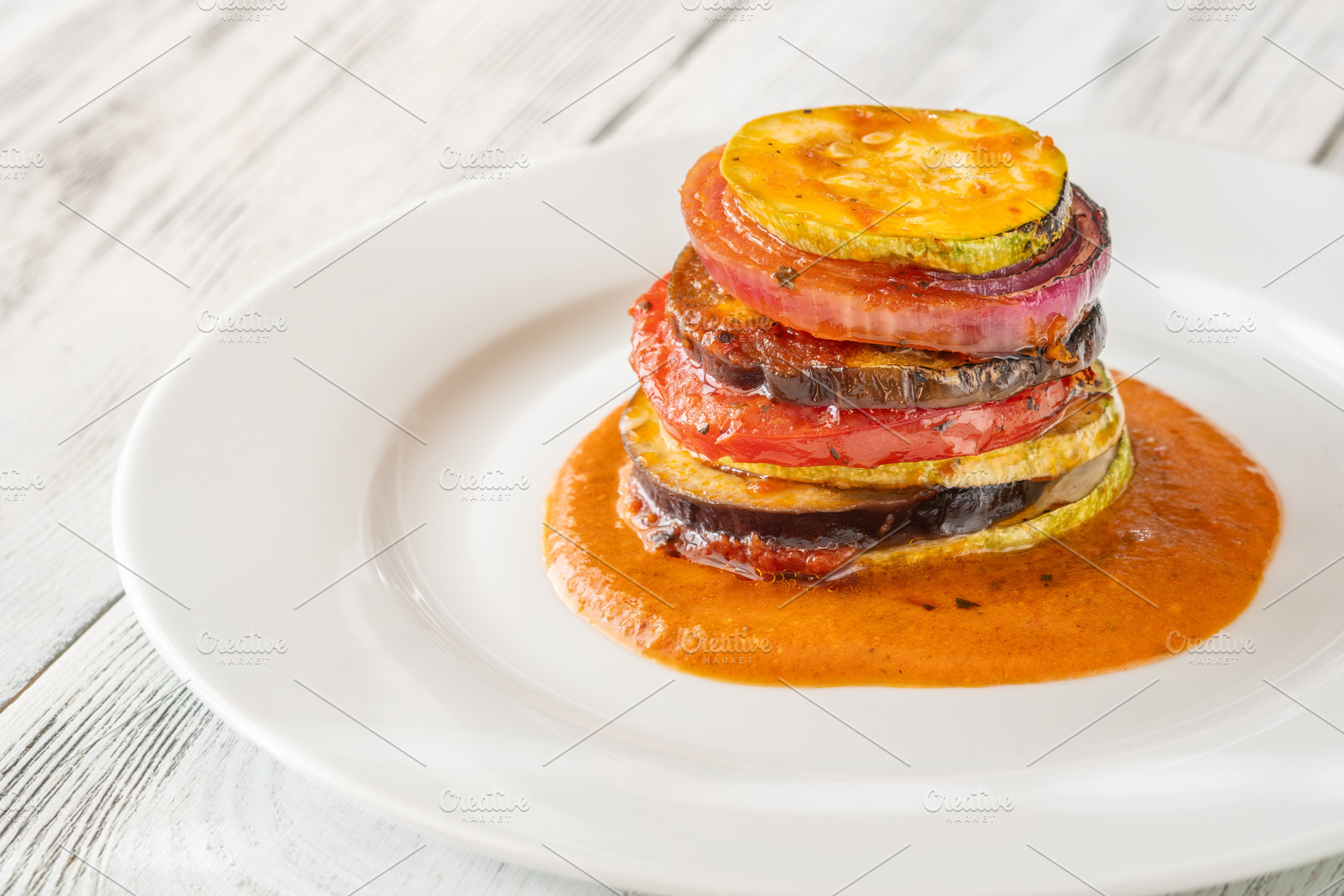 Elegant vertical ratatouille tower, a Food & Drink Photo by Alexander Prokopenko