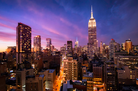 Beautiful sunset over manhattan, an Architecture Photo by inigocia