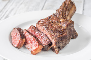 Sliced Grilled Cowboy Steak, a Food & Drink Photo by Alexander Prokopenko