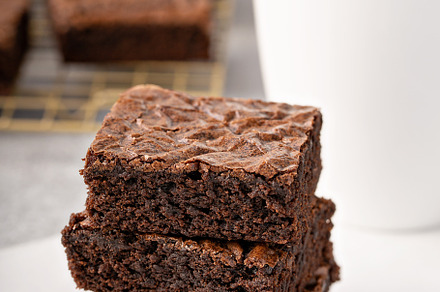 Stack of moist fudgy brownies, a Food & Drink Photo by farwasser
