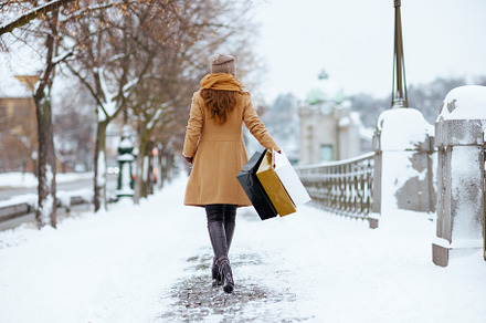 Seen from behind woman in brown hat and scarf, a Person Photo by Alliance Images