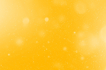 Snow flake particles on yellow background, a Holiday Photo by GoodGoods