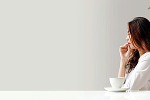 Young woman enjoying a peaceful morn, a Photo by LOGOCREATIVE