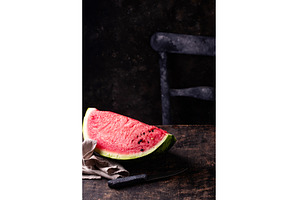 Fresh watermelon close up on dark, a Food & Drink Photo by Yulia Furman