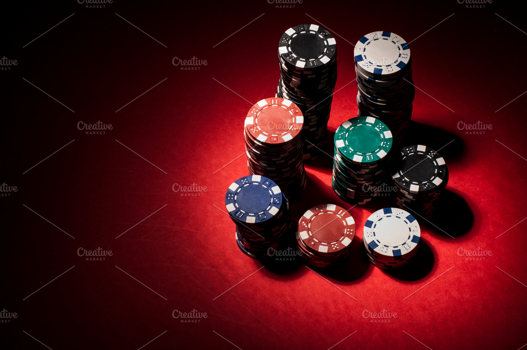 Gambling Chips On Red Surface