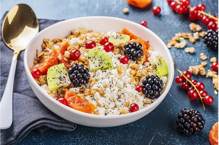Cottage cheese with granola, berries, a Food & Drink Photo by Ekaterina_Markelova