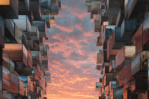 Man walking towards sunset through c, a Photo by Pixeness Studio