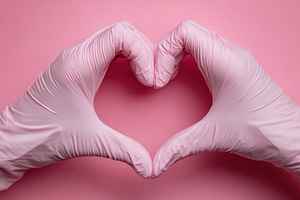Hands shaped in a heart gesture, a Photo by Beautiful things